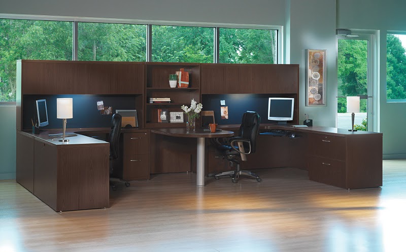 office with double desk and peninsula in the center